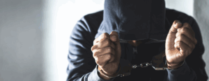 A boy in handcuffs for the Unlock drama blog about young people’s Academy in Hillingdon